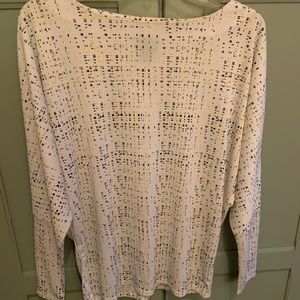 Stylish white top with black and gold design!